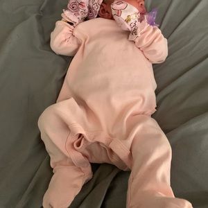 Light Pink footie with ruffle booty
